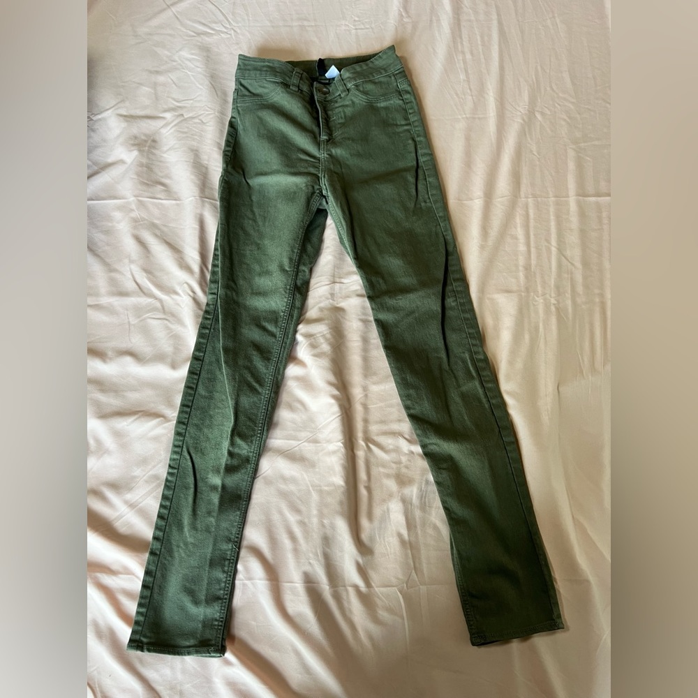 Divided green skinny jeans